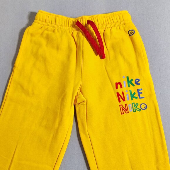 Nike Jogger pants men's youth size M yellow colour with multi-colour graphic - Picture 2 of 11